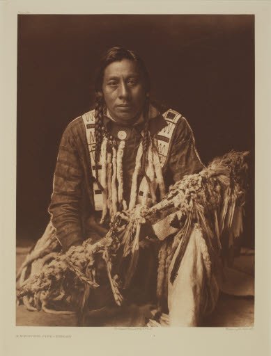 A Medicine Pipe-Piegan (plate 199; portfolio 6) - Photogravure